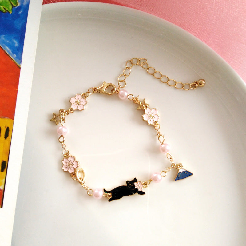 Pulsera de aleación de perlas de flor Fuji de montaje de aceite al por mayor